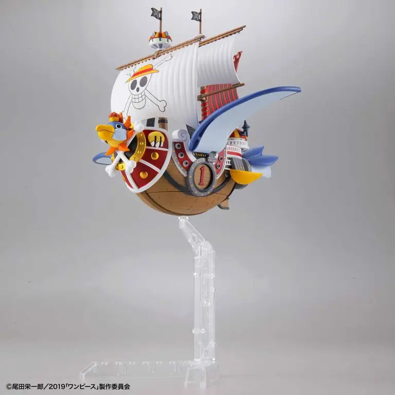 Petualangan di Atas Kapal Thousand Sunny Gambar kapal Thousand Sunny berlayar di lautan